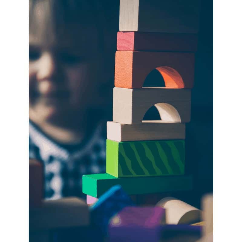 Photo of child with blocks to illustrate therapy for moms with postpartum depression Houston, TX 77006