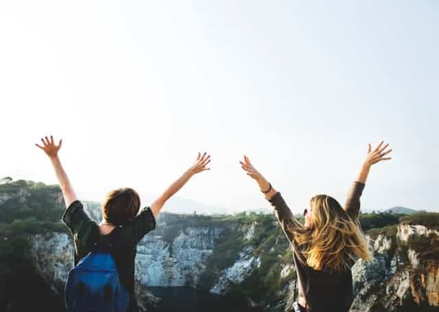 Photo of people with their hands in the air to show the benefits of anxiety treatment in Houston, Texas 77006