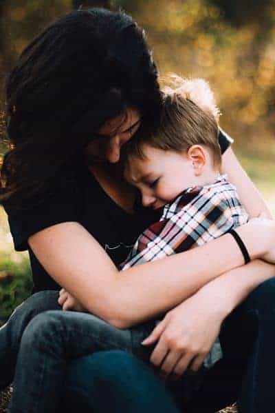 Photo of parent hugging child to illustrate child therapy Houston, TX 77006