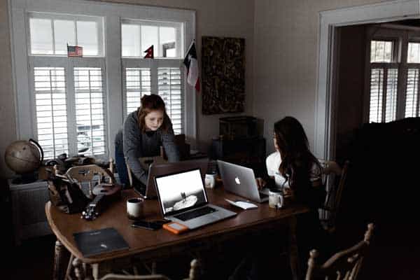 Photo of teens studying at table. Counseling for kids Houston, Texas 77006