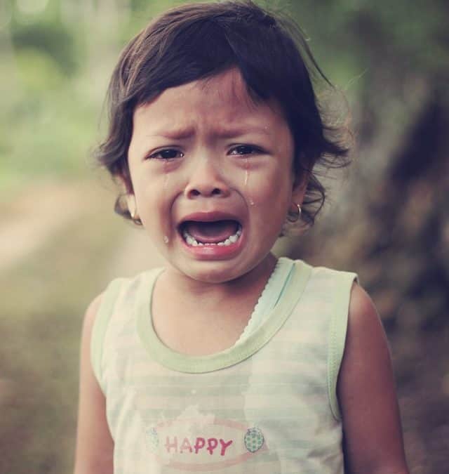 Image of toddler having a tantrum to illustrate tips for toddler tantrums