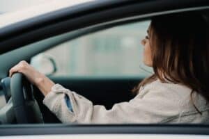 Image of a woman driving to illustrate hit and run OCD