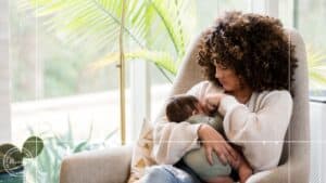 photo of a mother holding a baby to illustrate help for birth trauma in houston, texas